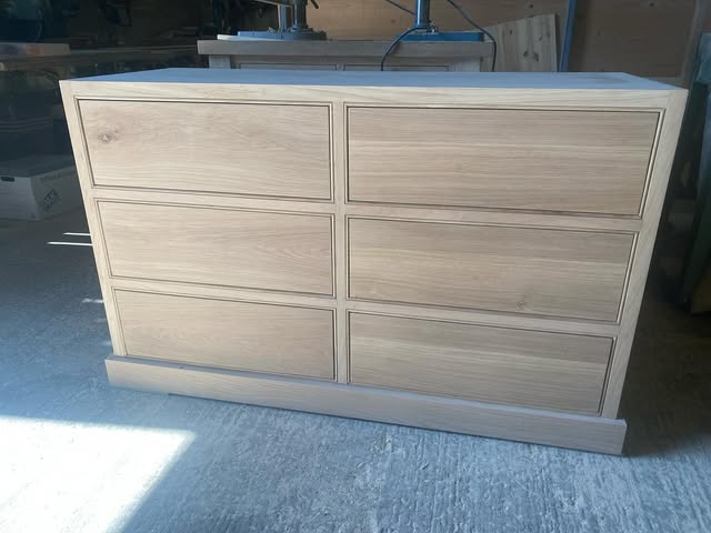 Unpainted wooden chest with six drawers